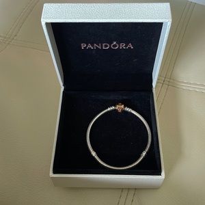 Pandora charm bracelet two tone (silver and rose gold)